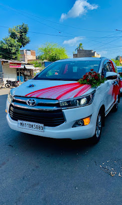 Decorated Toyota Innova Crysta for wedding transportation